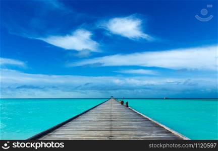 Maldives sea. tropical Maldives sea against blue cloudy sky