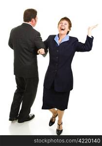 Male and femal business partner dancing around joyfully as their business is saved. Isolated on white.