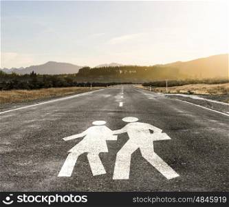 Male and female figures on asphalt road. Natural lanscape and asphalt road with people figures