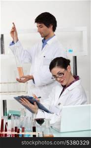 male and female laboratory technicians