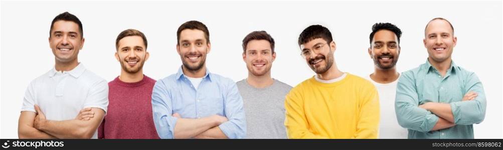 male and people concept - international group of happy men with crossed arms isolated on white background. international group of happy men with crossed arms