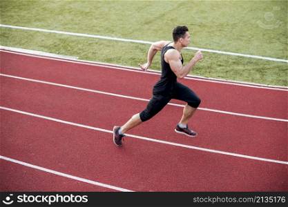 male athlete arrives finish line racetrack during training session