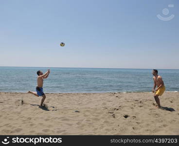 male beach volleyball game player jump on hot sand