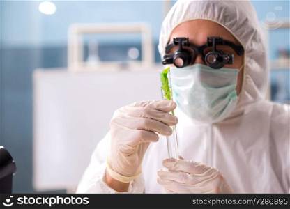 Male biotechnology scientist chemist working in the lab 