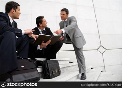 Male businessmen on steps