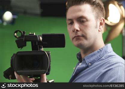 Male Camera Operator In Television Studio