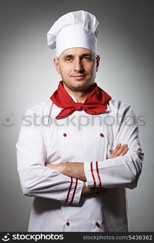 Male chef portrait against grey background