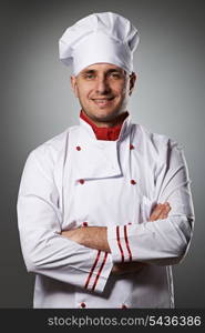 Male chef portrait against grey background