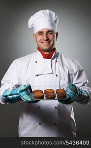 Male chef portrait against grey background