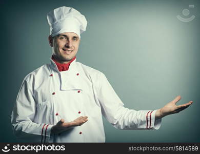 Male chef portrait against grey background