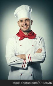 Male chef portrait against grey background