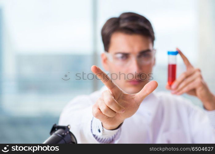 Male chemist working in lab