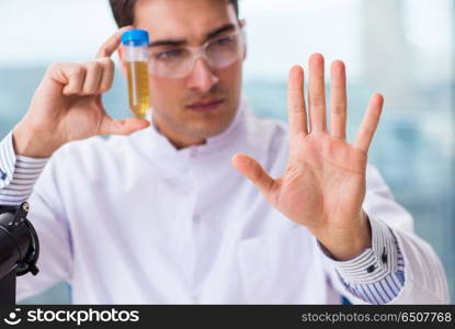 Male chemist working in lab