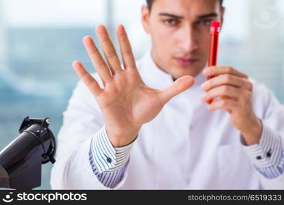 Male chemist working in lab