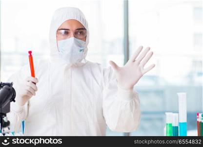 Male chemist working in lab
