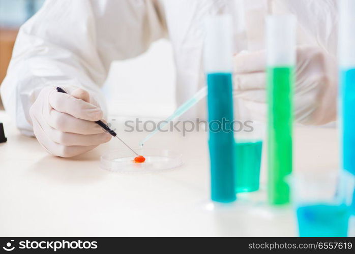 Male chemist working in lab