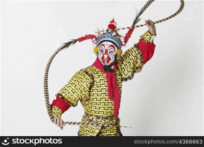 Male Chinese opera performer gesturing