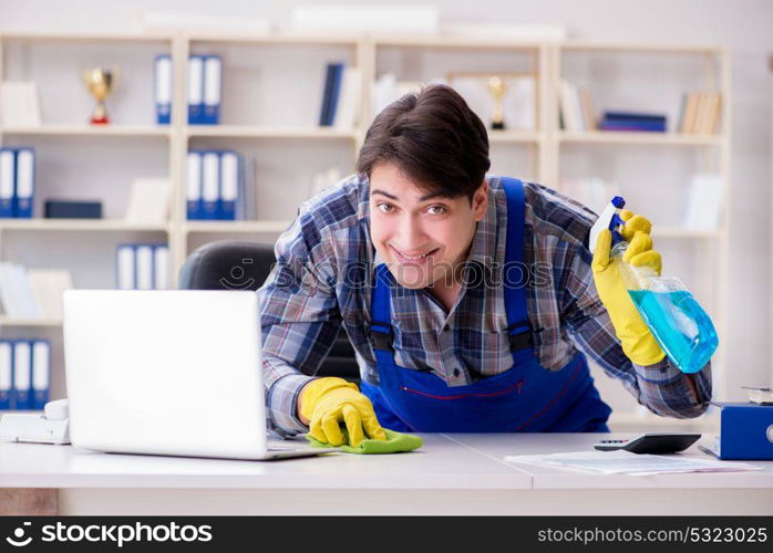 Male cleaner working in the office