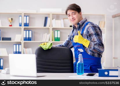 Male cleaner working in the office