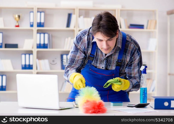 Male cleaner working in the office