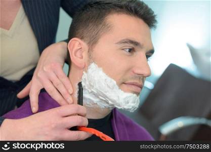 male client visiting barber shop