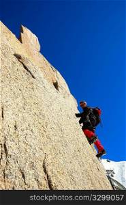 Male climber, Rock-climbing sport, vertical orientation, day light; Mont Blanc massif