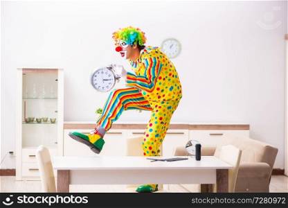 Male clown preparing for perfomance at home 