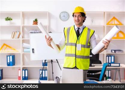 Male construction engineer working in the office 