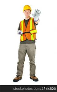 Male construction worker directing with hand signals in vest and hard hat
