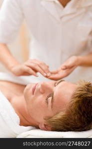 Male cosmetics - facial massage at luxury spa