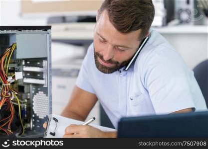 male customer resolving his computer problem