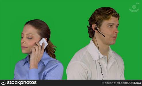 Male customer service speaks with woman (Green Key)