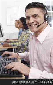 Male Customer Services Agent In Call Centre