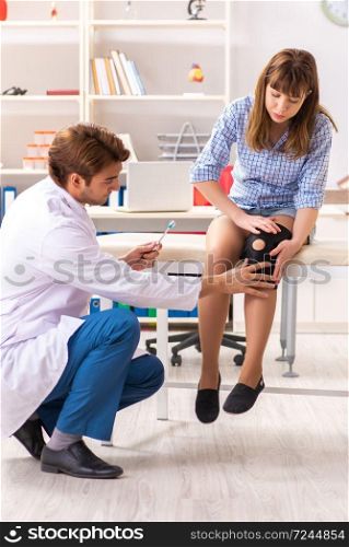 Male doctor checking with sensory hammer