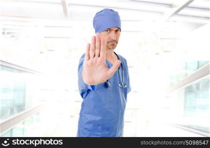 male doctor going stop with his hand, at the hospital