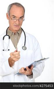 Male doctor holding clipboard
