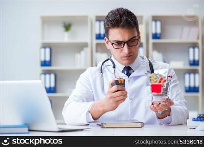 Male doctor in anti-smoking conceptwithcigarette pack