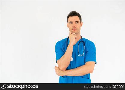 Male doctor in hospital uniform standing on white background. Healthcare and medical concept.
