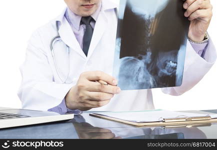 Male doctor is examined x-ray film