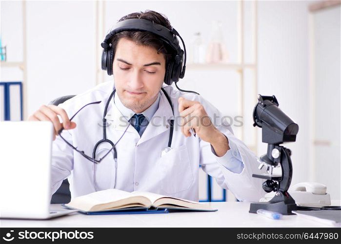 Male doctor listening to patient during telemedicine session