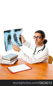 Male doctor looking at x-ray image