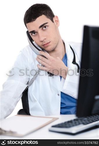 Male doctor speaking over telephone over white background