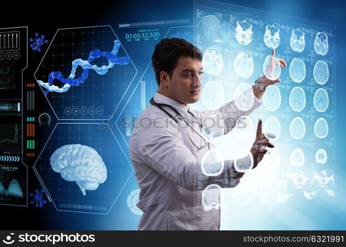 Male doctor studing x-ray image of MRI scan