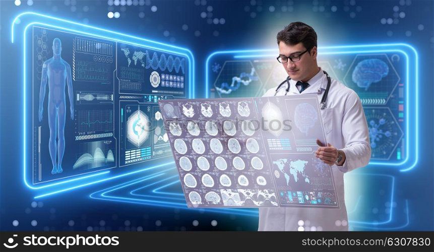 Male doctor studying results of brain mri scan