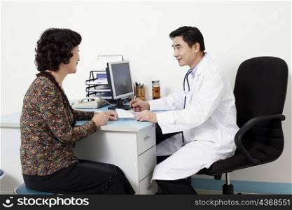 Male doctor talking to a patient