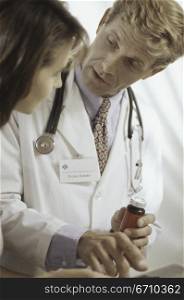 Male doctor talking to a woman