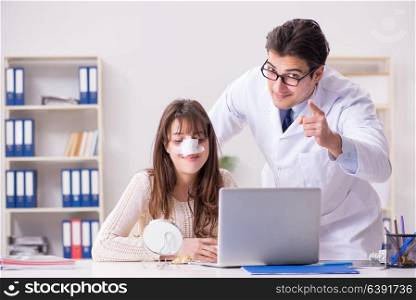 Male doctor talking to patient with nose operation surgery