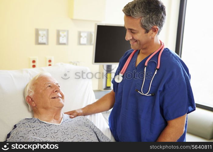 Male Doctor Talking With Senior Male Patient