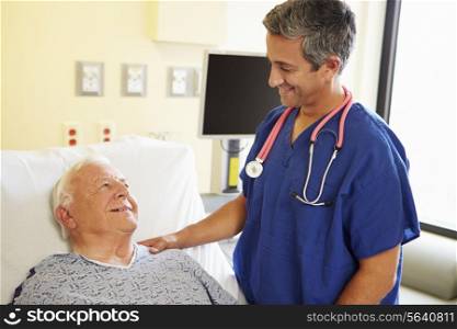 Male Doctor Talking With Senior Male Patient