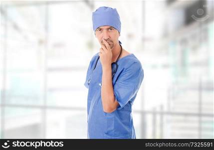 male doctor thinking, at the hospital